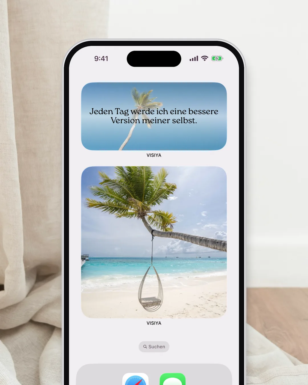 Ein iPhone-Home-Bildschirm mit dem Vision-Board-Widget von VISIYA unter dem Widget mit der Affirmation des Tages