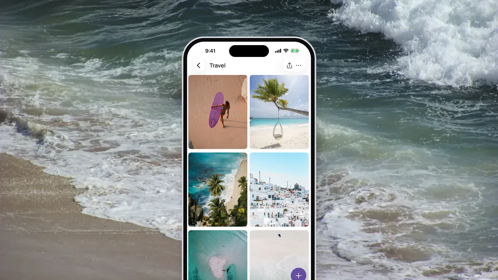 An iPhone showing the Travel area of a VISIYA vision board, set against waves rolling onto a sandy beach