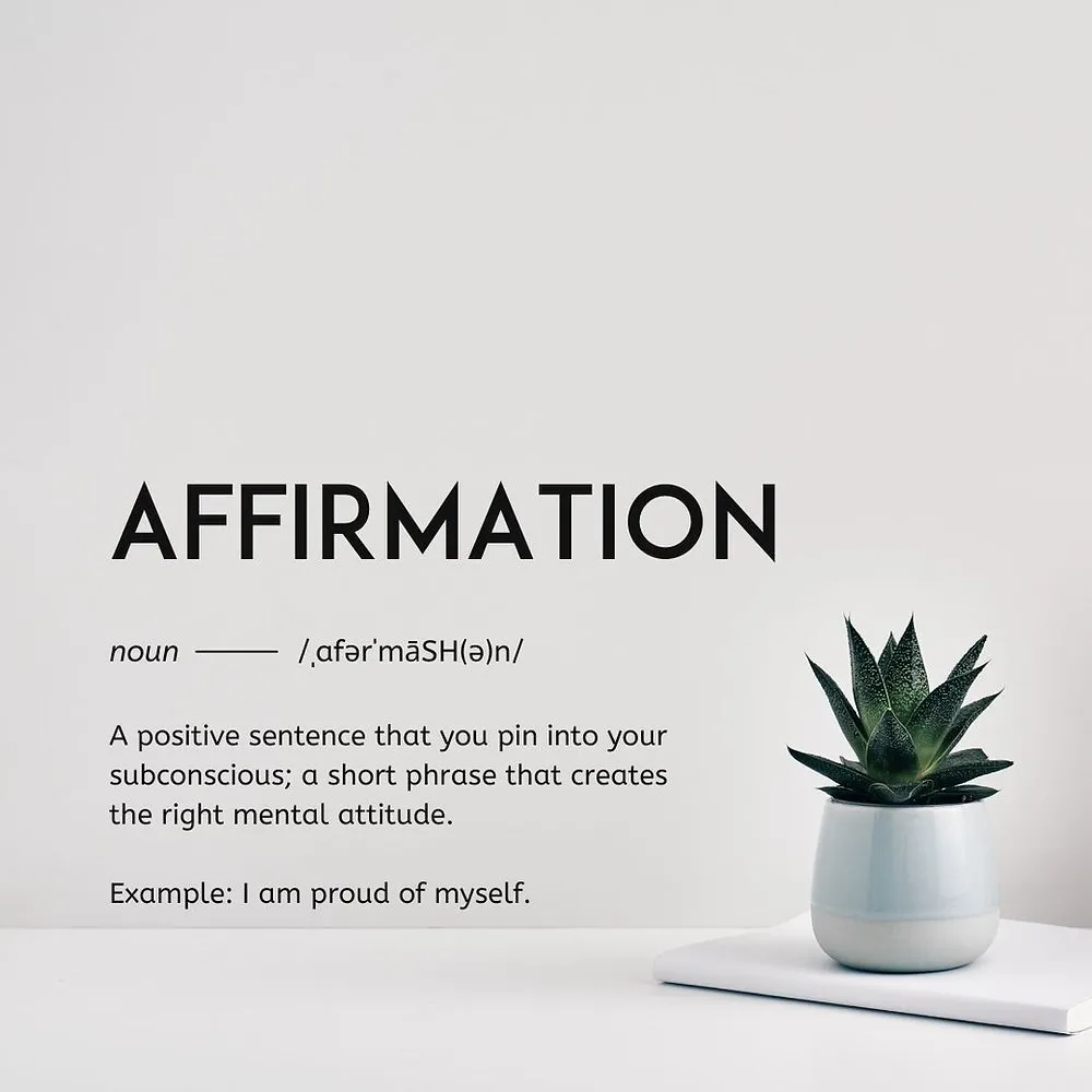 Dictionary-style definition of the word 'AFFIRMATION' beside a small potted succulent on white